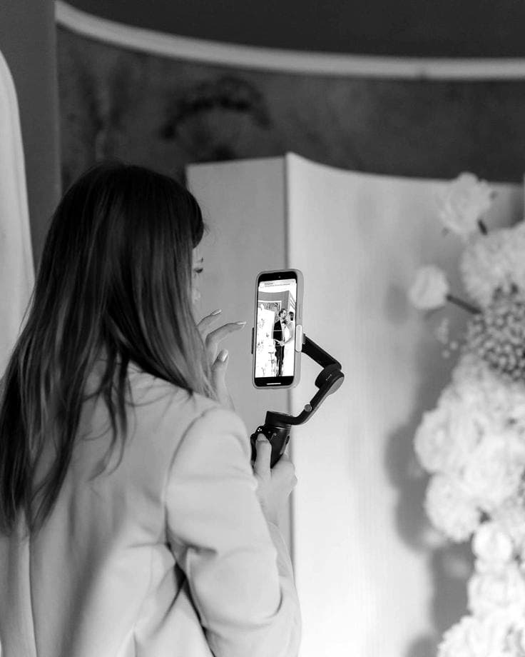 Creator filming content on a gimbal